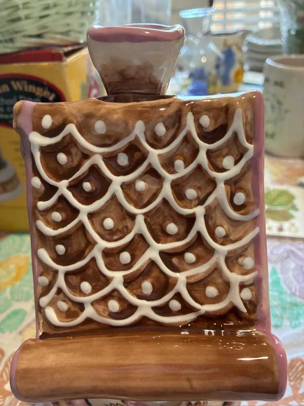 Blue Sky “The Gingerbread Cottage”. In new condition. Pink, brown, red & green.